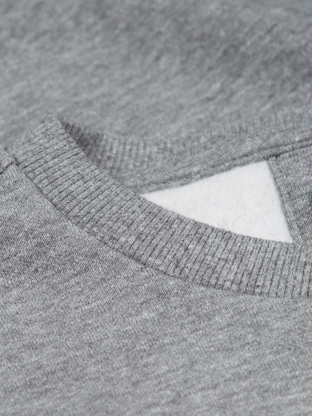 Men's grey tracksuit with crew neck sweatshirt and matching joggers.