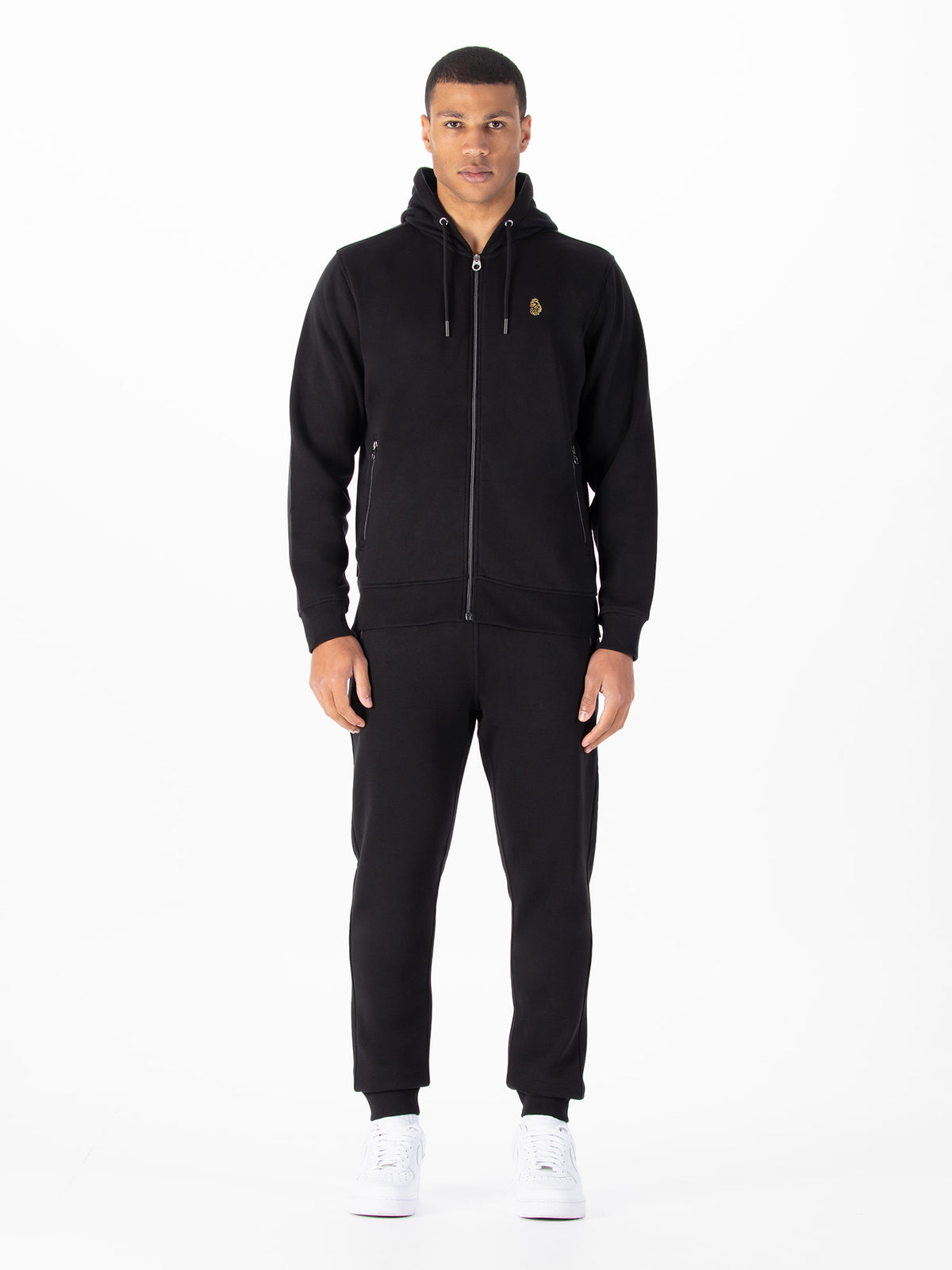 Men's black tracksuit with zip-up hoodie and matching joggers.