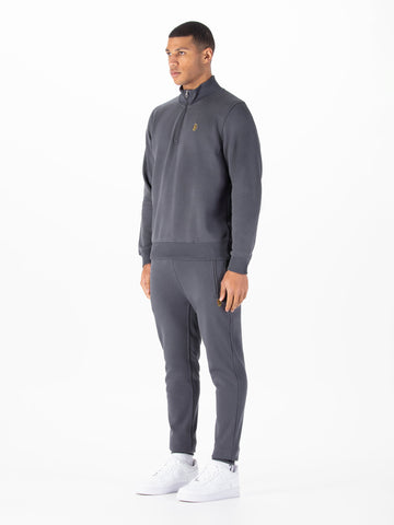 Men's grey tracksuit with zip-up sweatshirt and matching joggers.