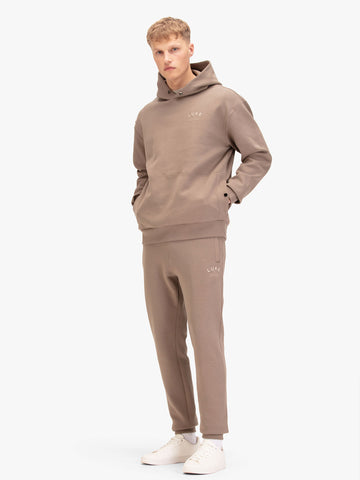 Men's relaxed-fit brown , worn by a model.