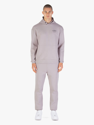 Men's grey tracksuit with pullover hoodie and matching joggers.