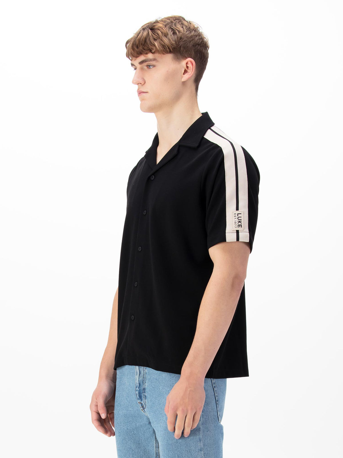 Men's black shirt with button-up front.