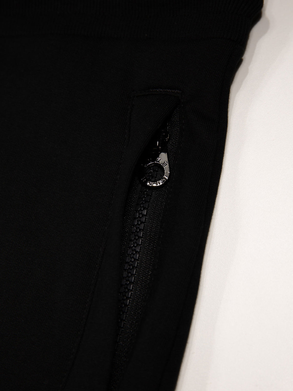 Men's black shorts with drawstring waistband.