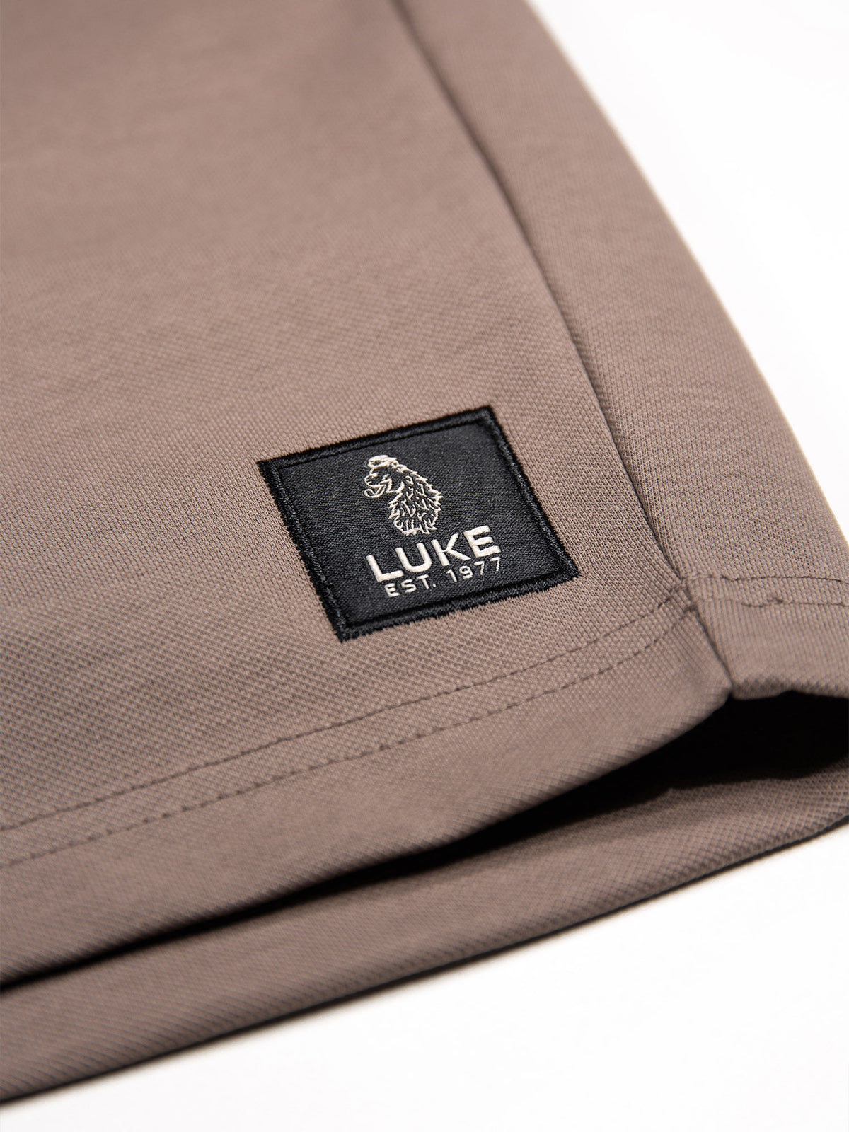 Men's brown shorts with drawstring waistband.