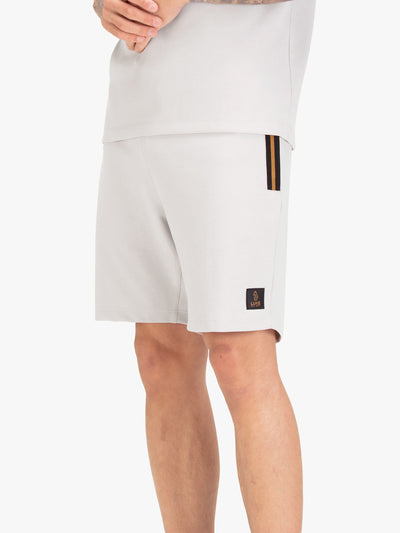 Men's grey shorts with drawstring waistband, worn by a model, front view