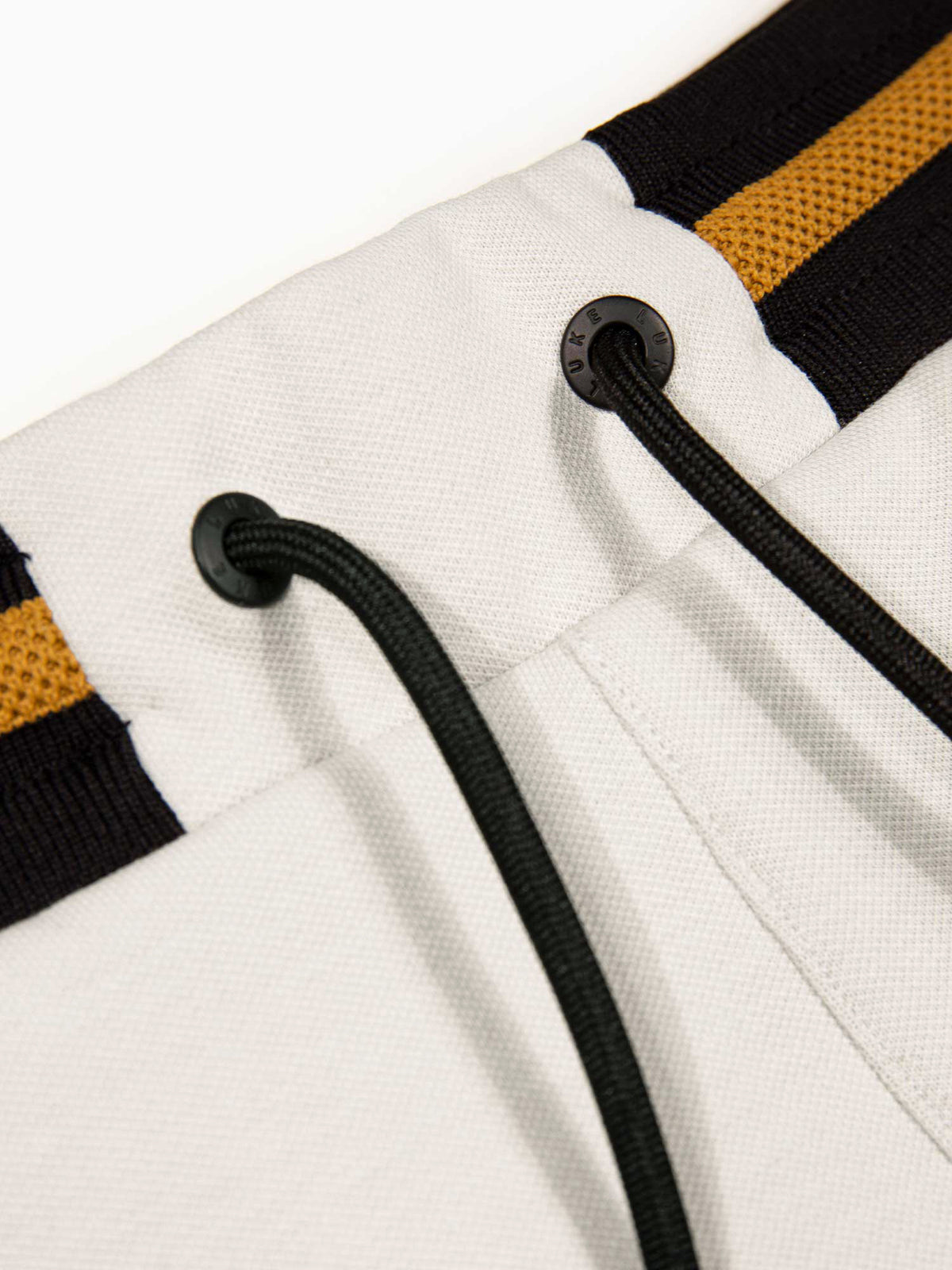 Men's grey shorts with drawstring waistband, detail view 1