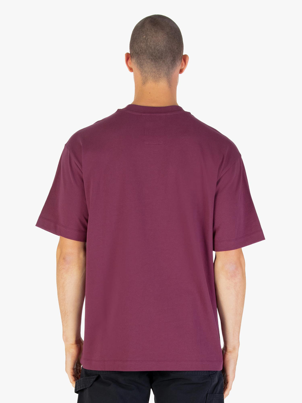 Men's relaxed-fit red t-shirt with crew neck and short sleeves worn by a model - back view.