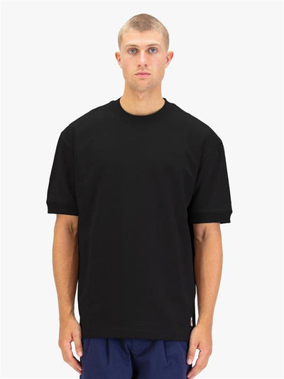 Men's black t-shirt with crew neck and short sleeves worn by a model - front view.