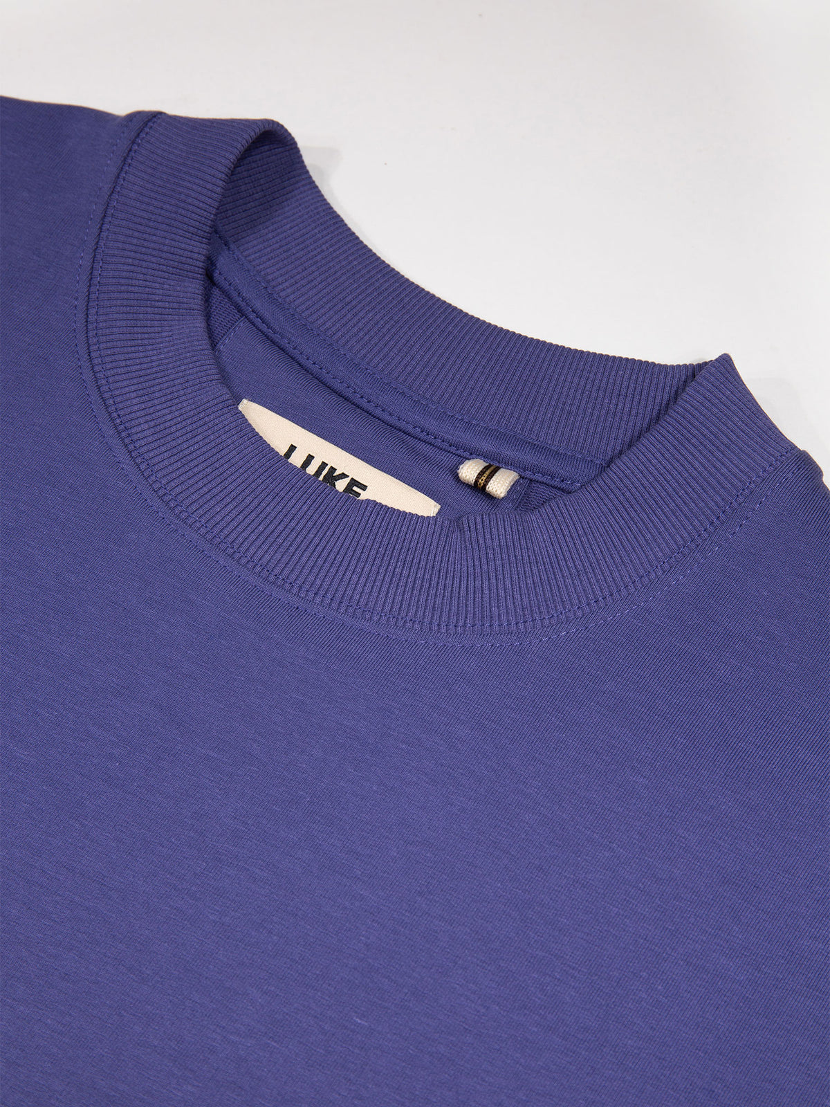 Men's purple t-shirt with crew neck and short sleeves.