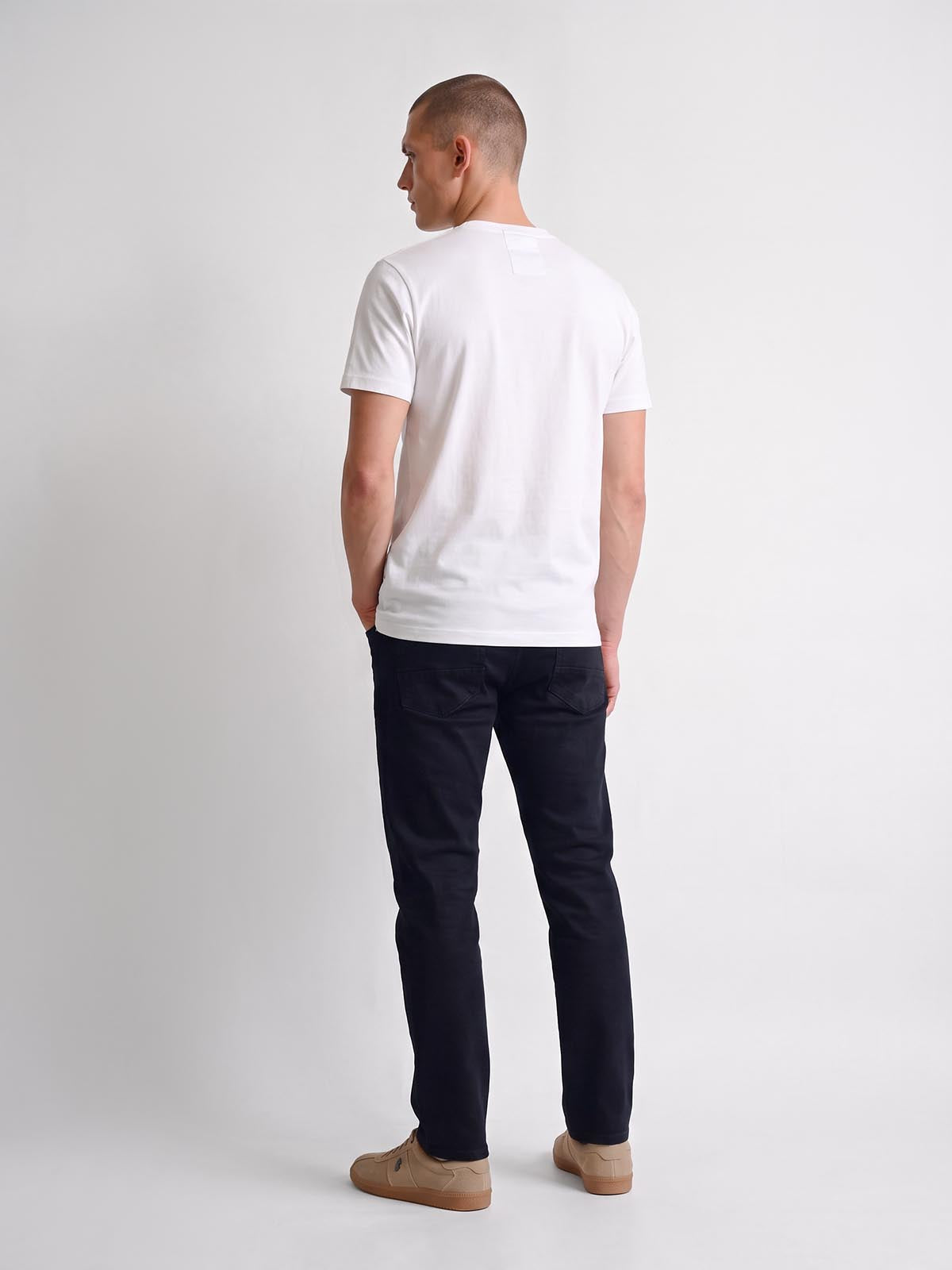 Back view of white LUKE 1977 Kirk t-shirt worn by model