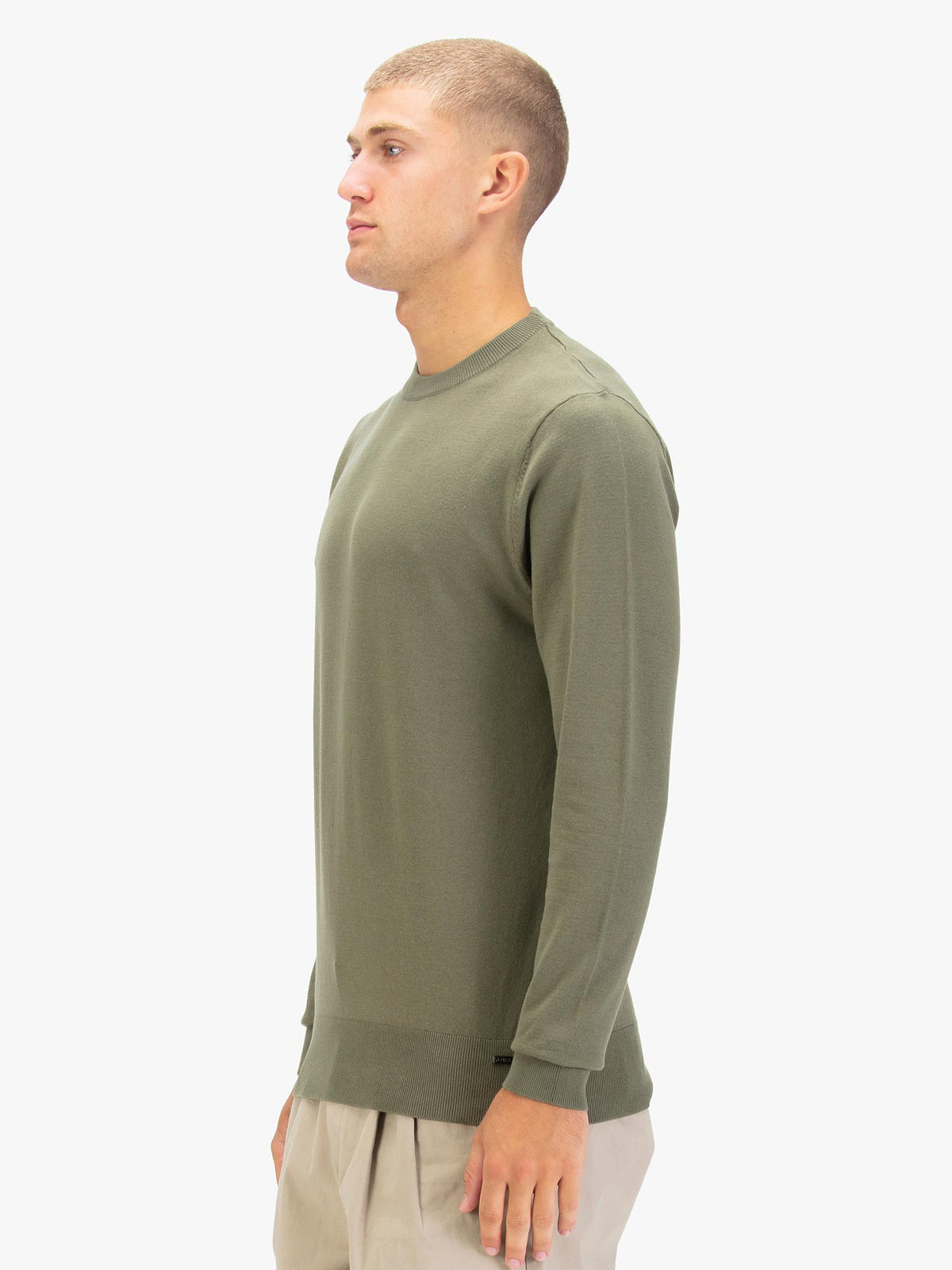 Men's green jumper.