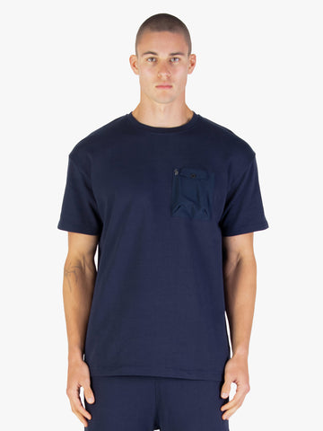 Men's navy t-shirt with crew neck and short sleeves worn by a model - front view.