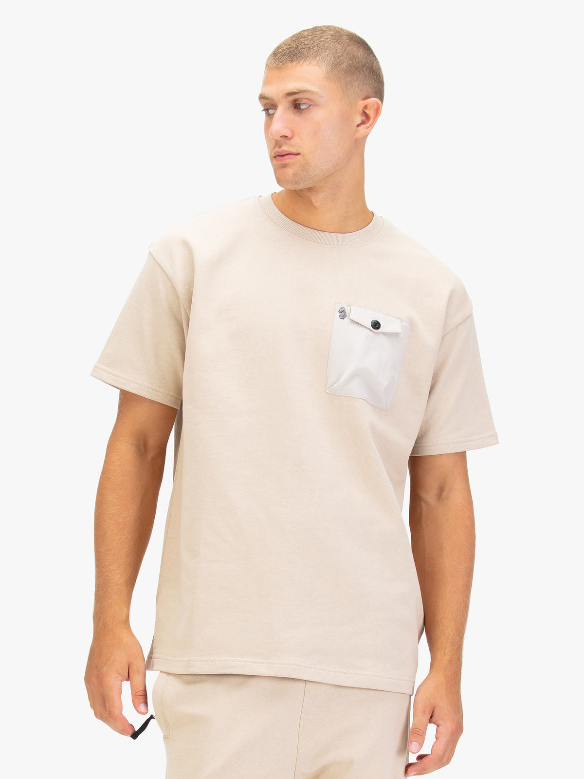 Men's beige t-shirt with crew neck and short sleeves.