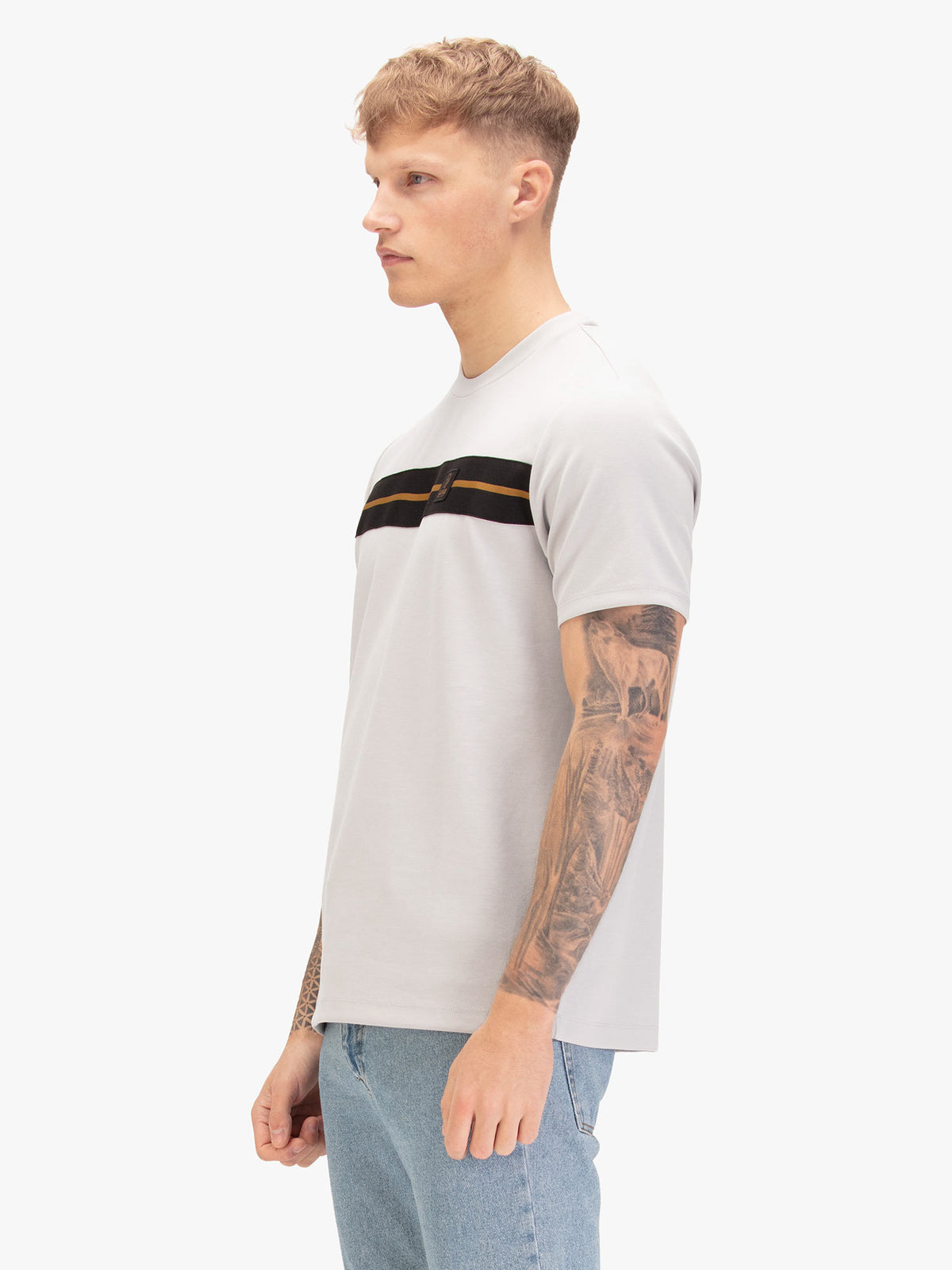 Men's grey t-shirt with crew neck and short sleeves, worn by a model, side view