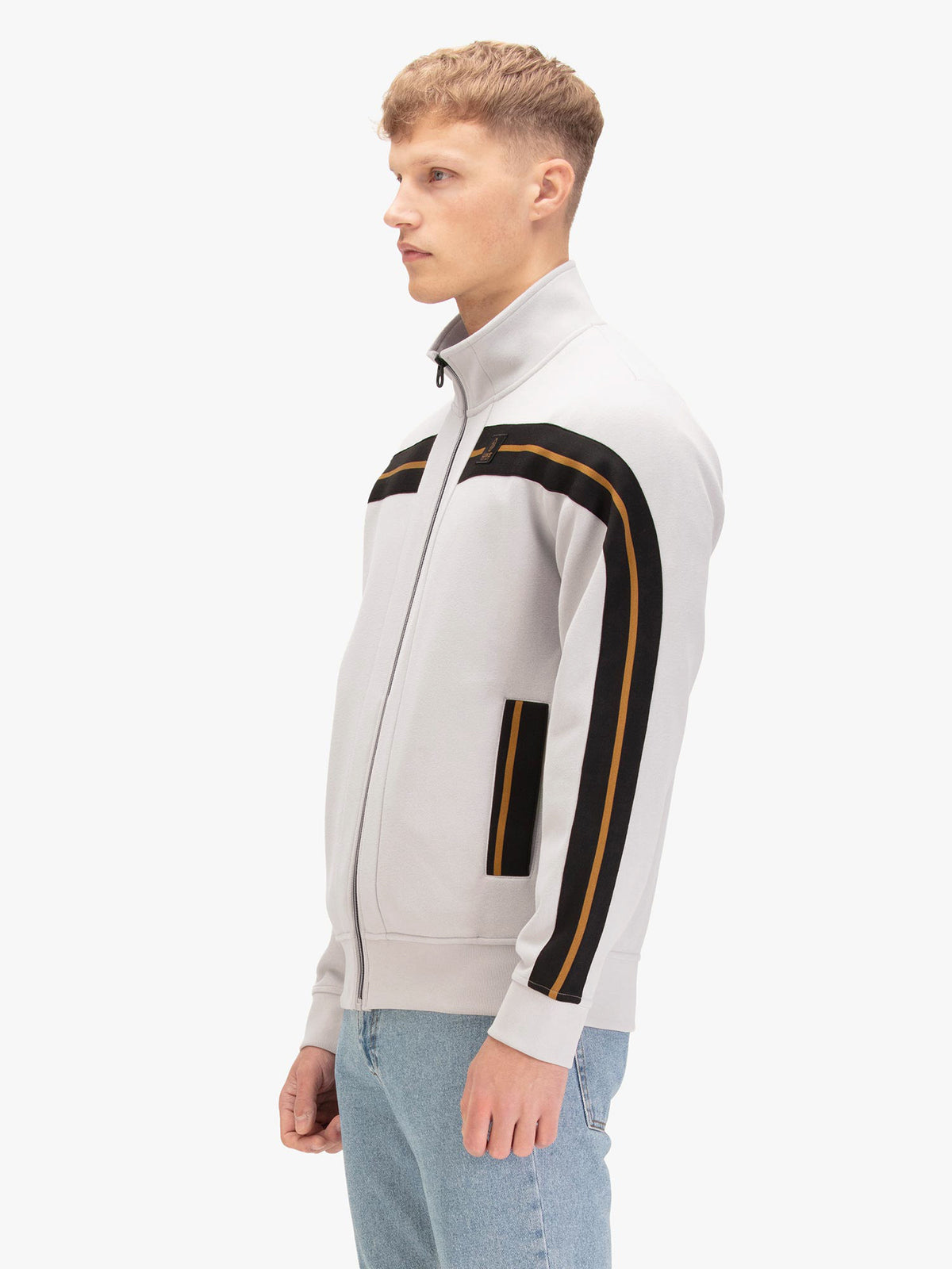 Men's grey sweatshirt with front pocket, worn by a model, side view