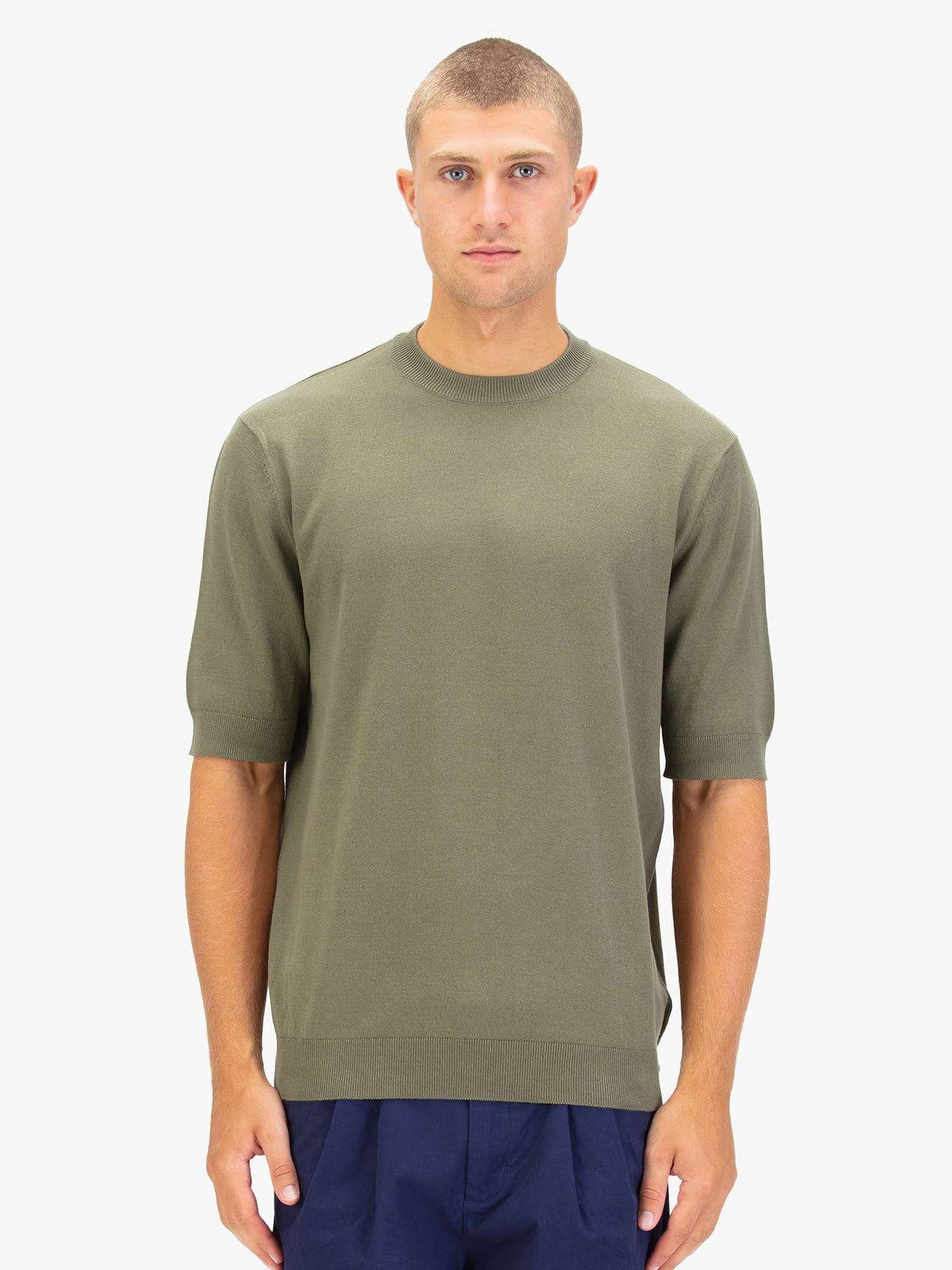 Men's green jumper.