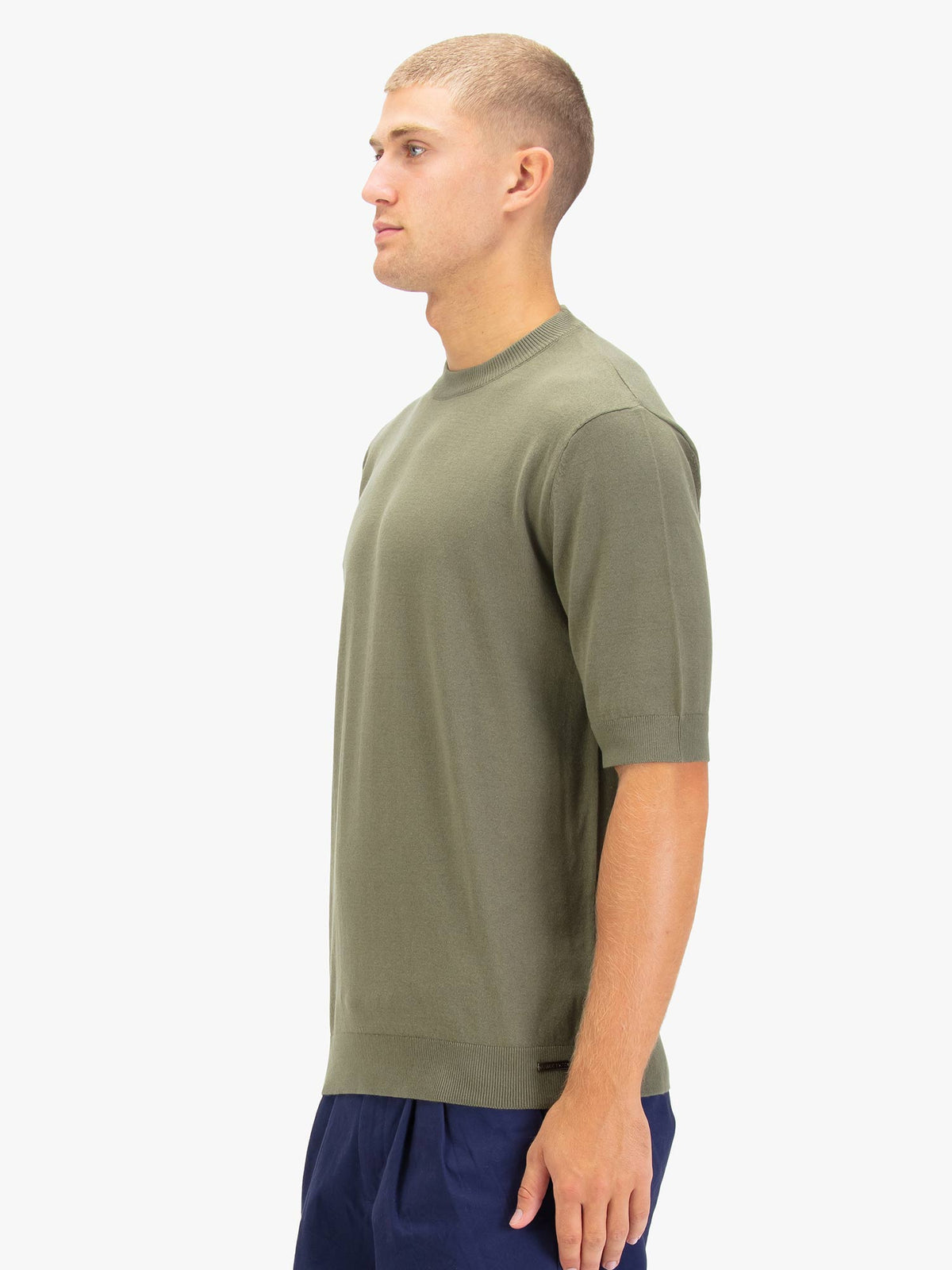 Men's green jumper.