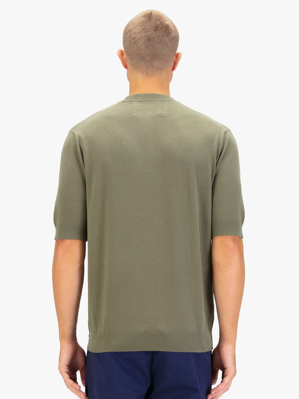 Men's green jumper.