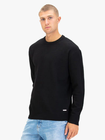 Men's black jumper.