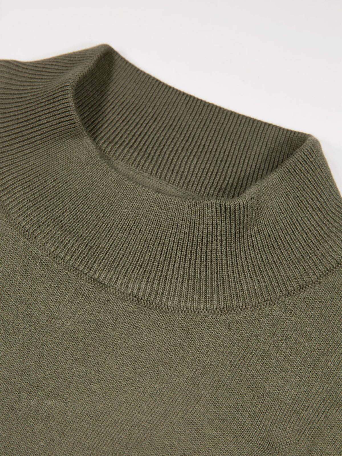 Men's green jumper.