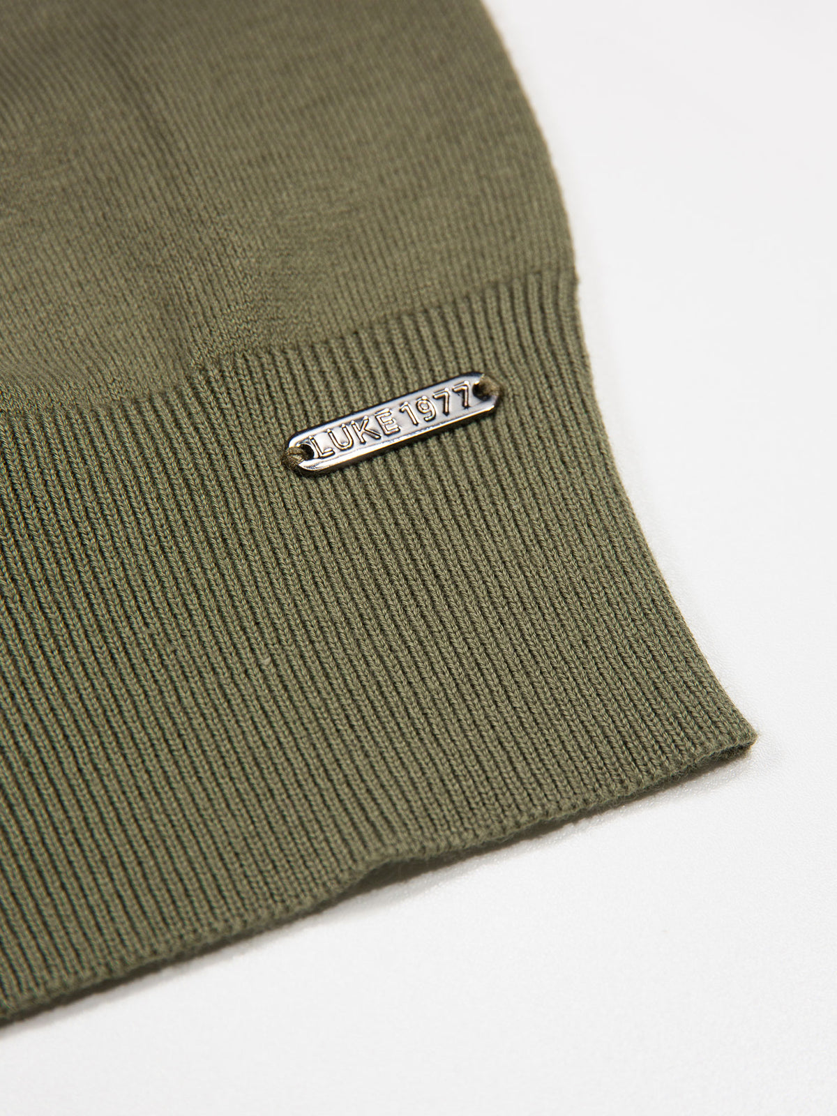Men's green jumper.