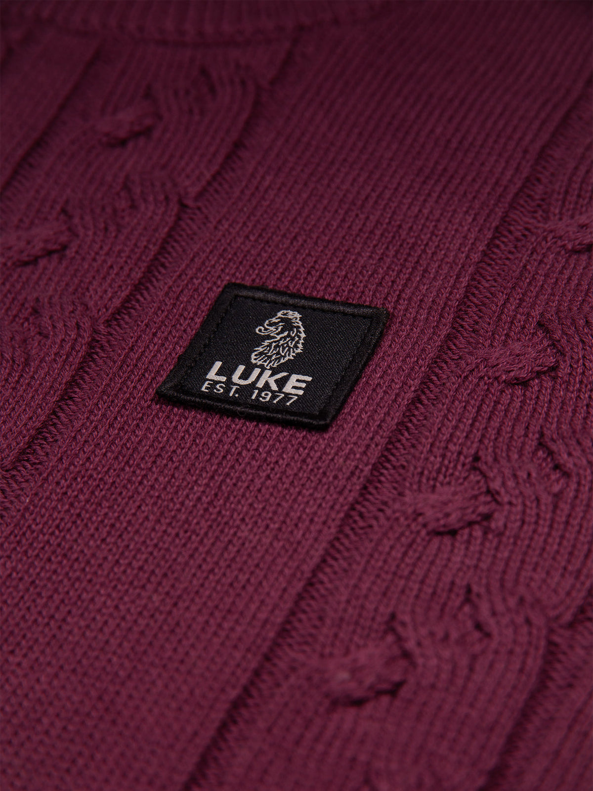 Men's red jumper.