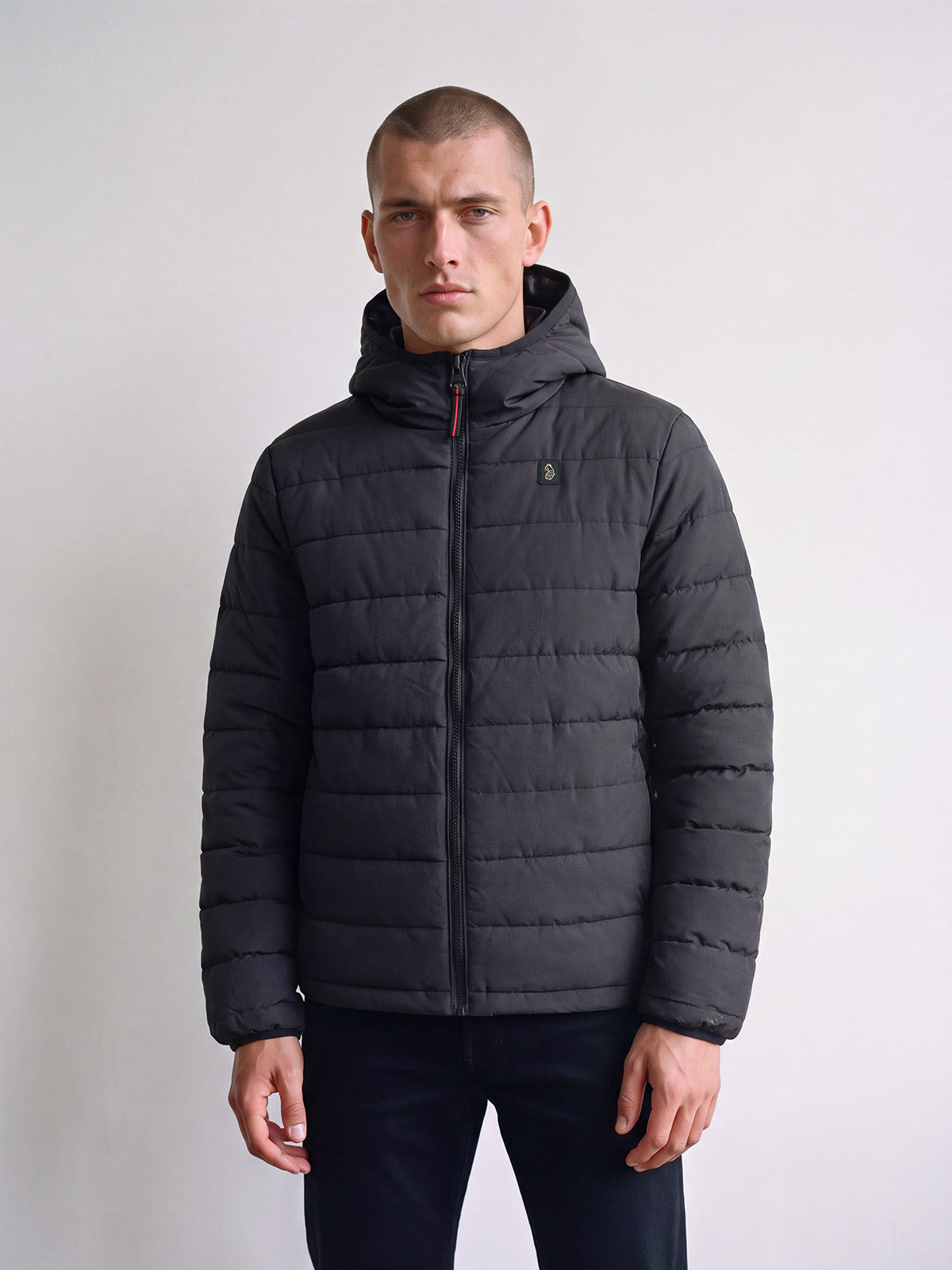 Man wearing black LUKE 1977 Mayor Of Cantoria hooded jacket, front view