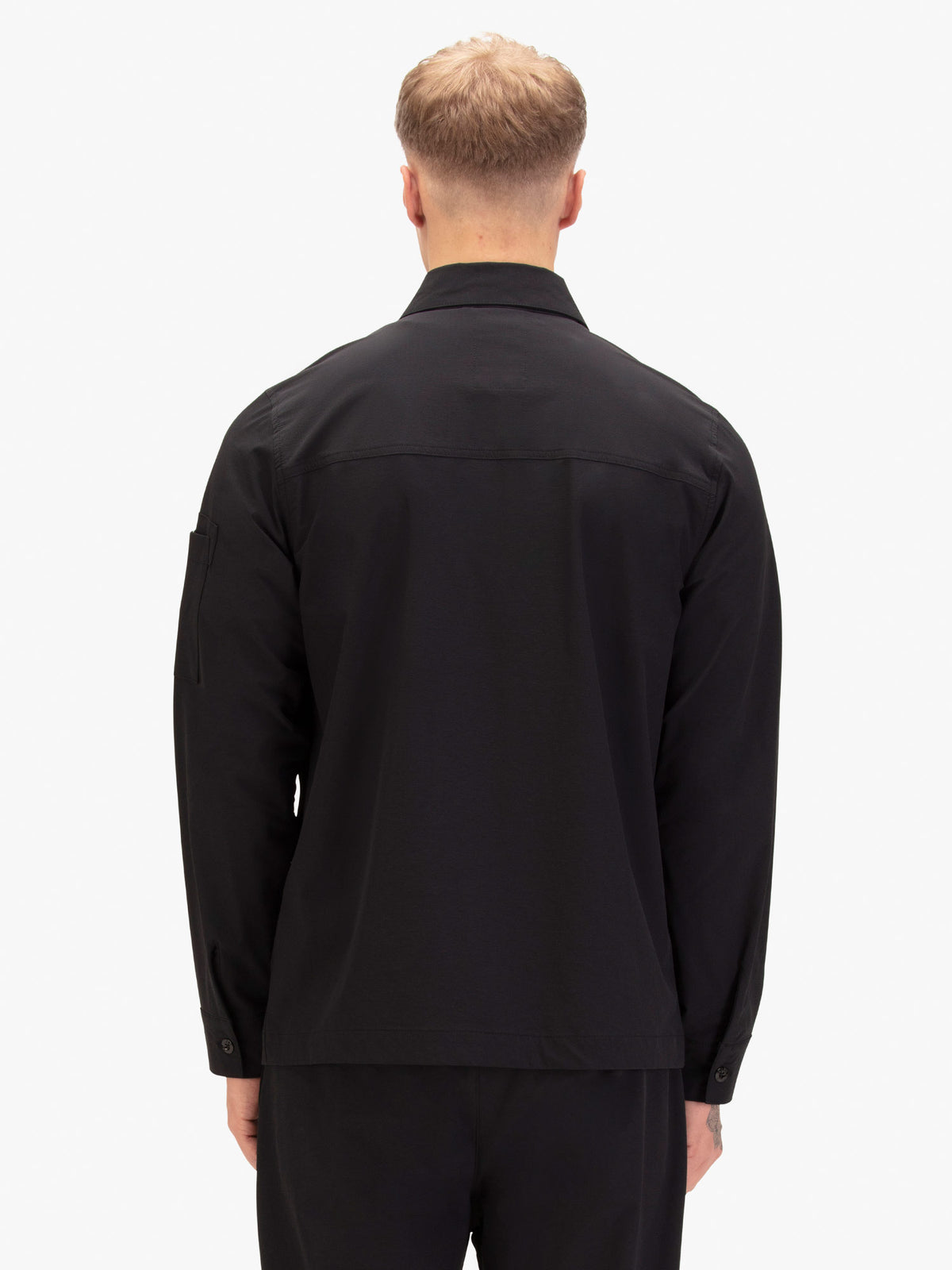 Men's black shirt with button-up front.