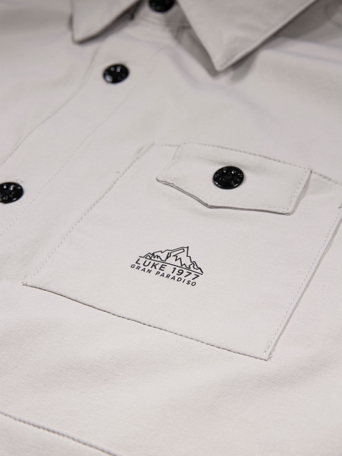 Men's grey shirt with button-up front.