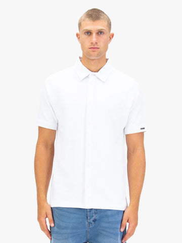 Men's white polo shirt with polo collar.