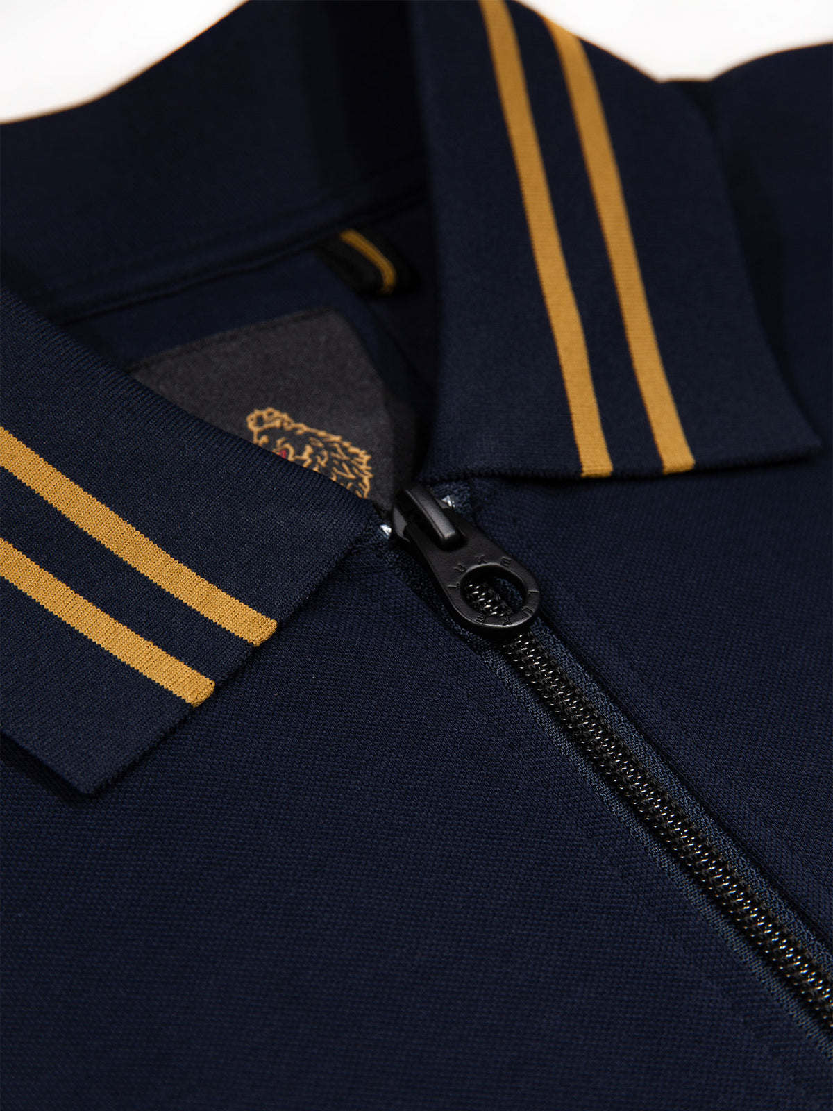Men's navy polo shirt with polo collar.