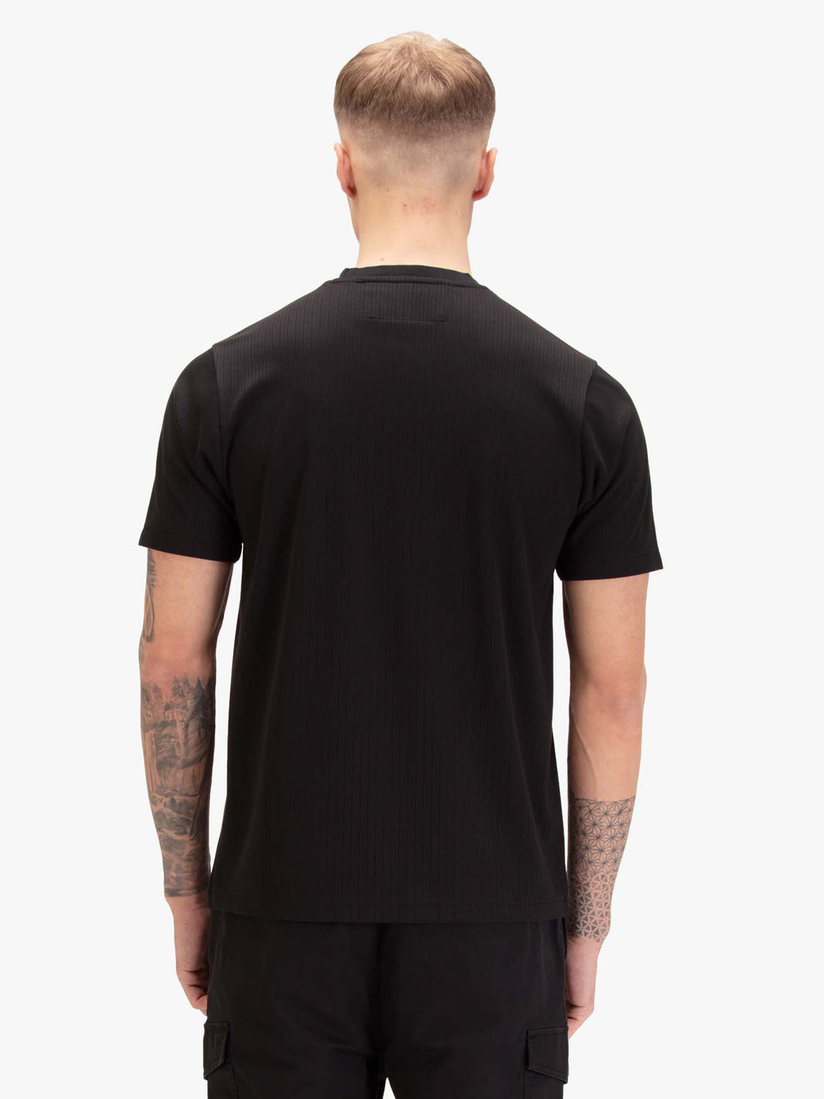 Men's black t-shirt with crew neck and short sleeves, worn by a model, back view
