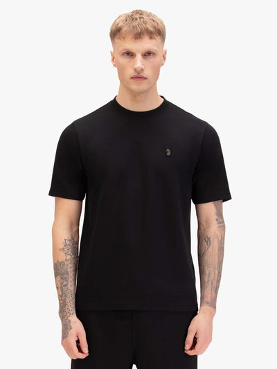 Men's black t-shirt with crew neck and short sleeves, worn by a model, front view