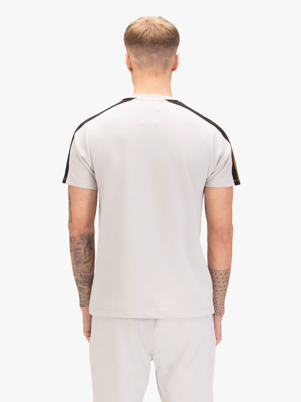 Men's grey t-shirt with crew neck and short sleeves, worn by a model, back view
