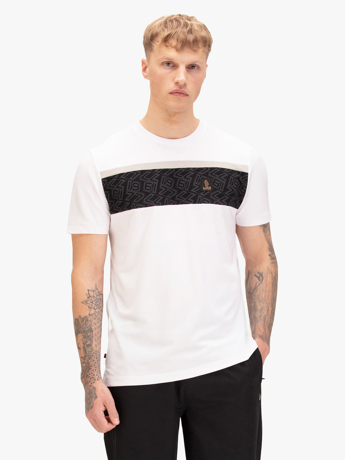 Men's white t-shirt with crew neck and short sleeves, worn by a model, front view