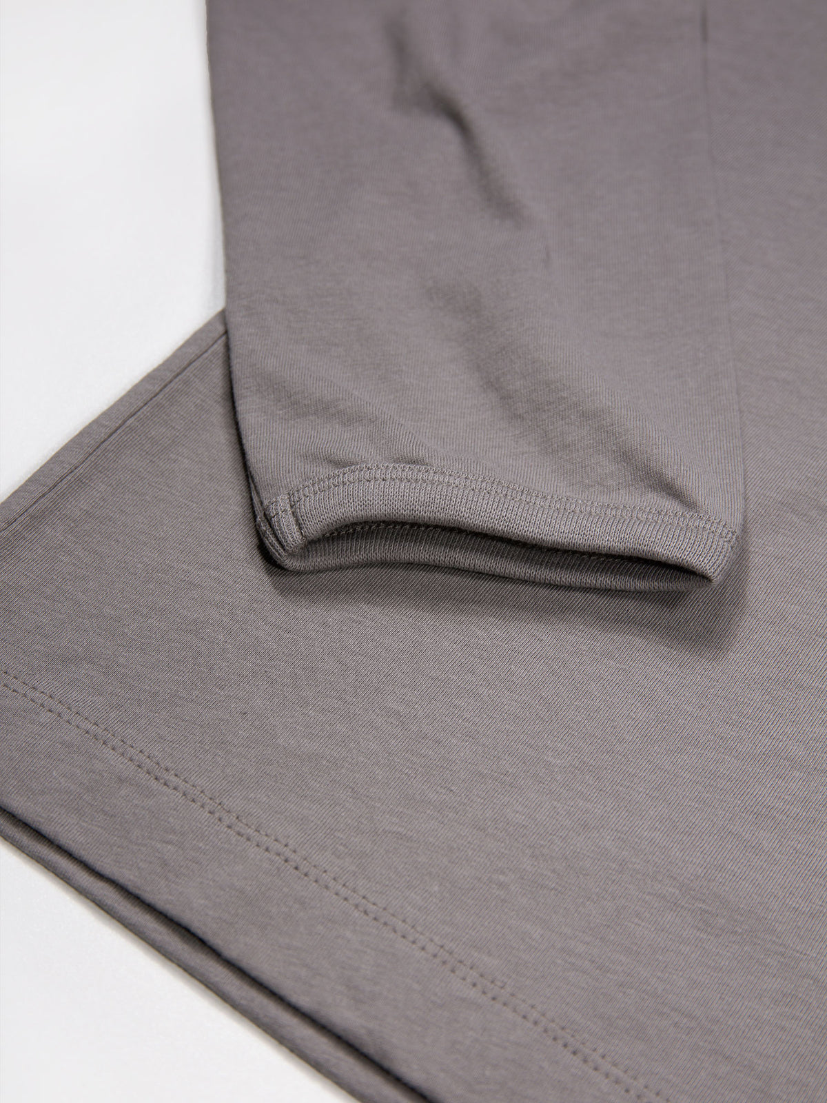 Men's grey long sleeved t-shirt - detail view of the sleeve.