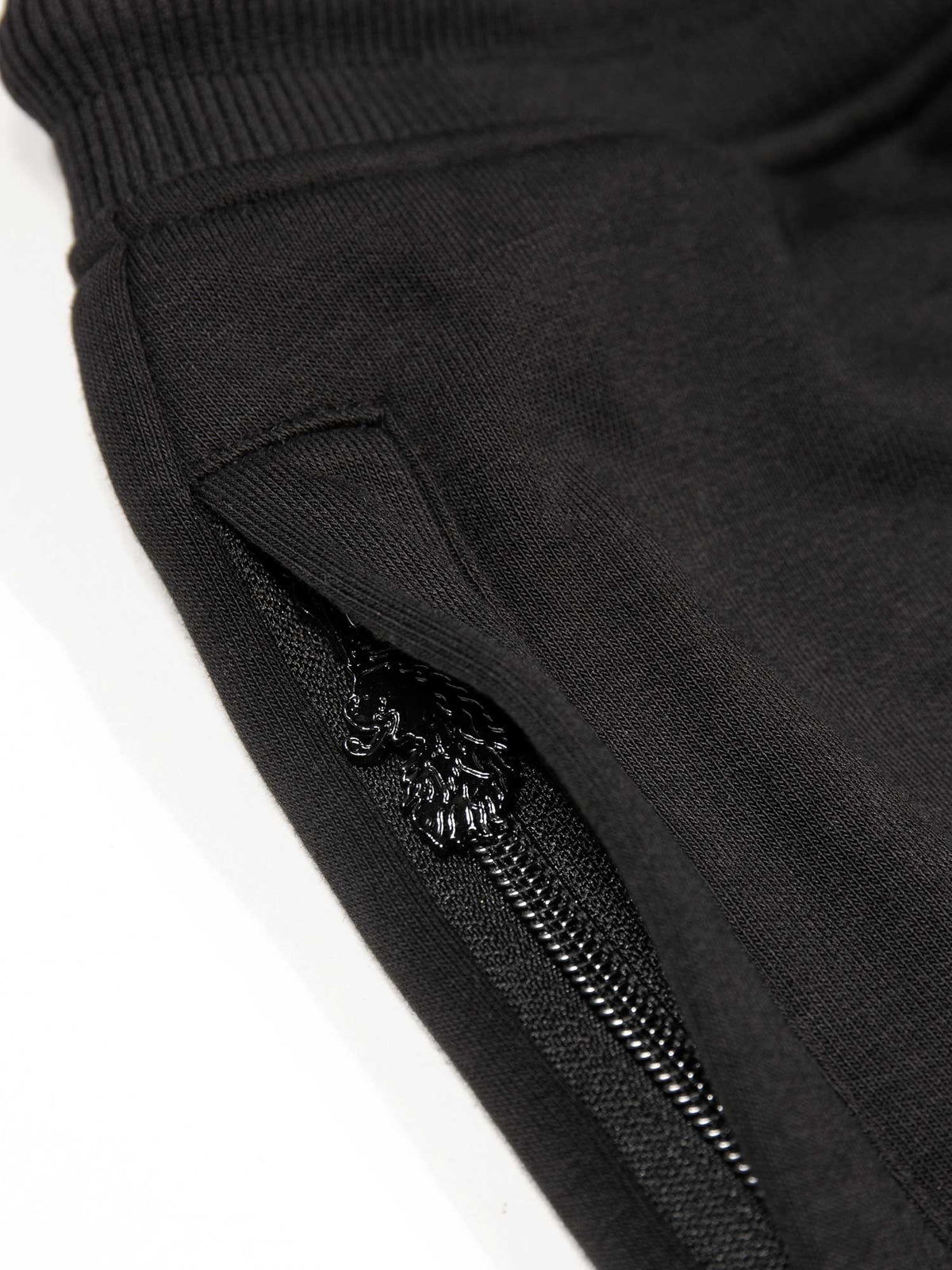 Men's wide-leg black joggers with drawstring waistband, detail view 2
