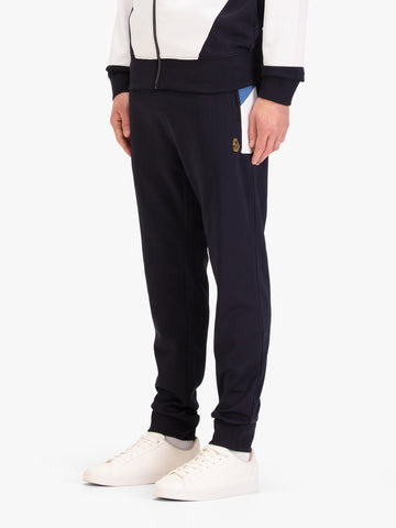 Men's navy joggers, worn by a model, side view