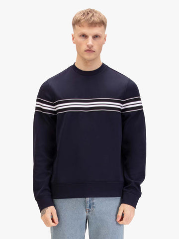 Men's navy sweatshirt with crew neck, worn by a model, front view