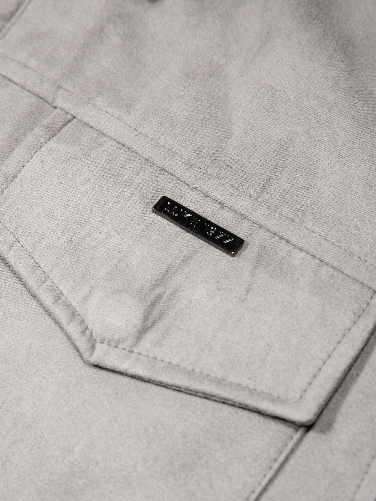 Men's grey jacket with zip-up front and front pocket, detail view 2