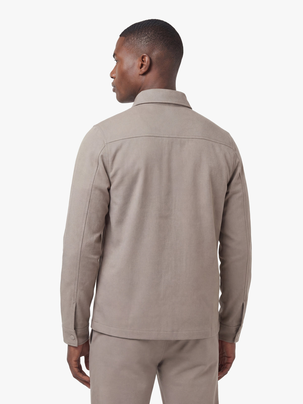 Men's brown shirt with button-up front, back view