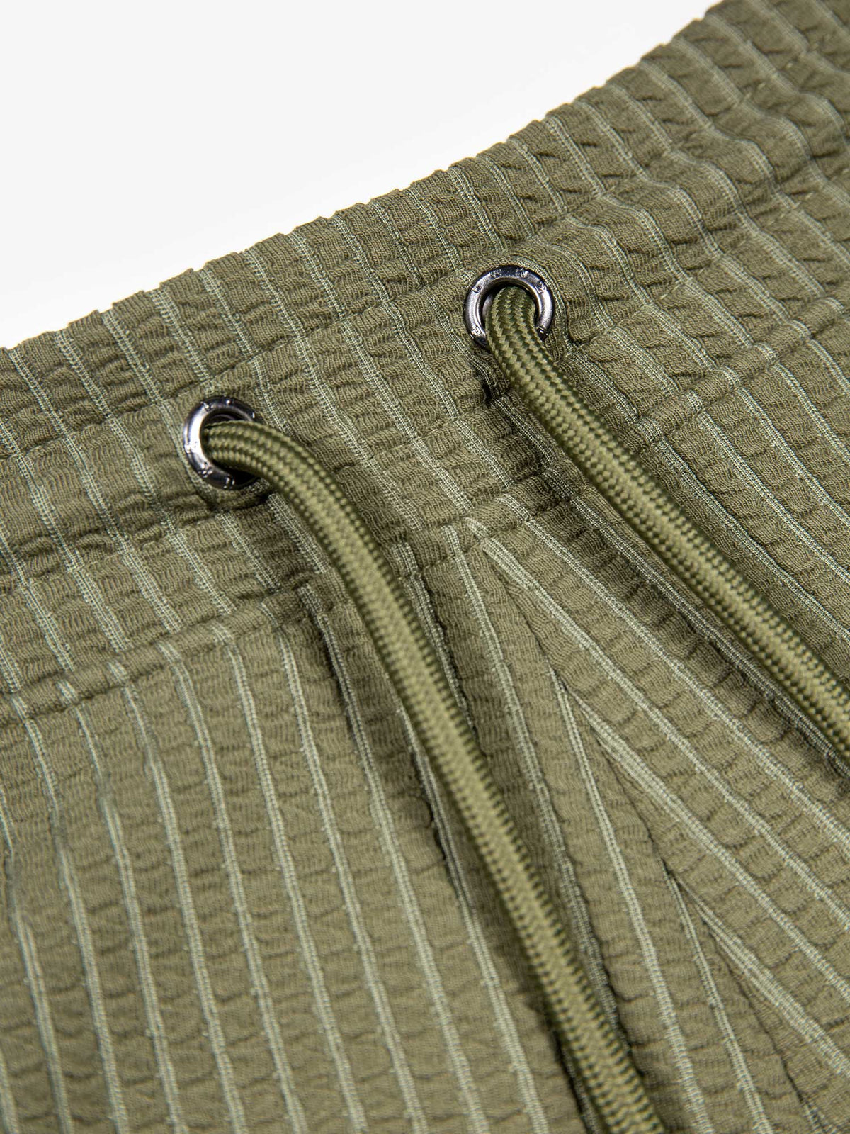 Men's green shorts with drawstring waistband, detail view 1