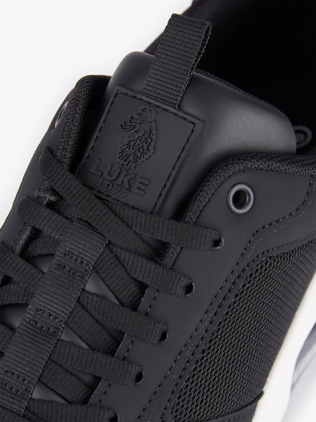 Men's black footwear.