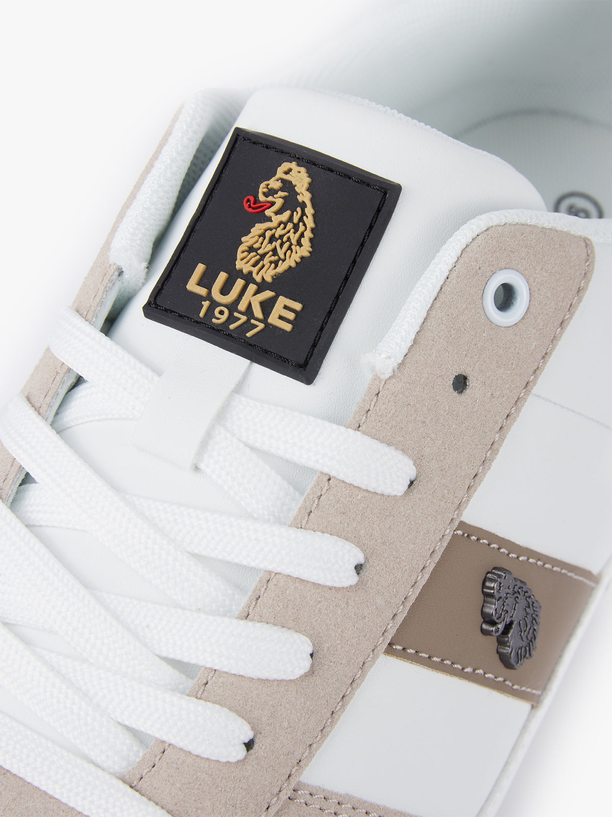 Men's white footwear.