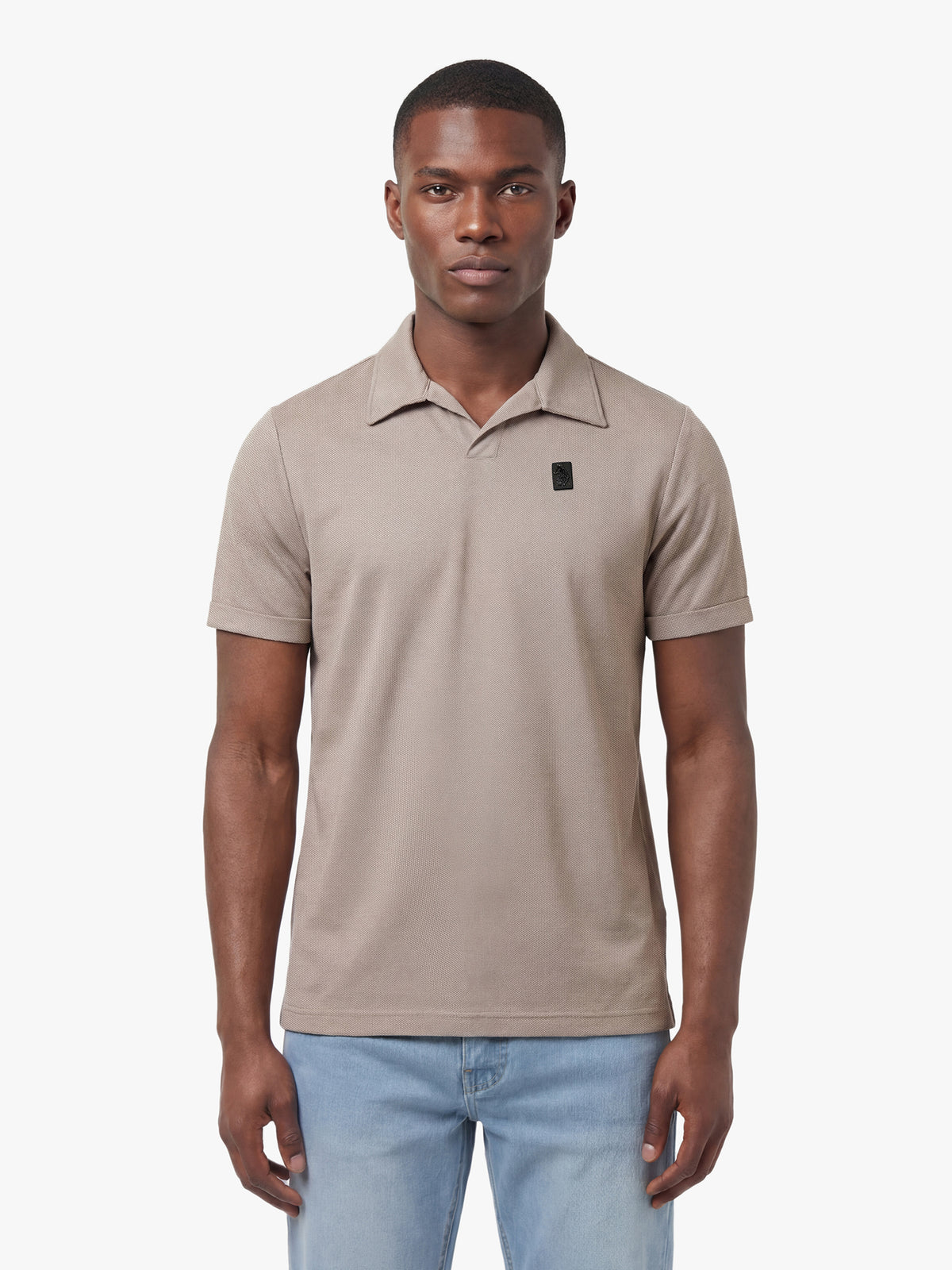 Men's brown polo shirt with polo collar, worn by a model, front view