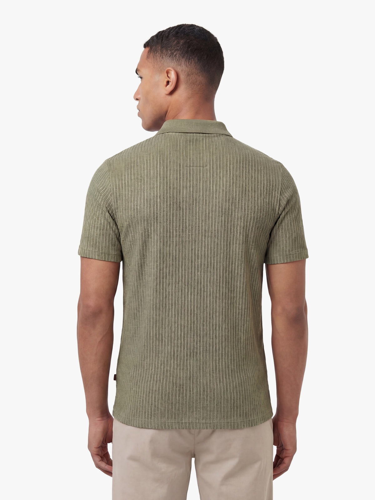 Men's green polo shirt with polo collar, back view