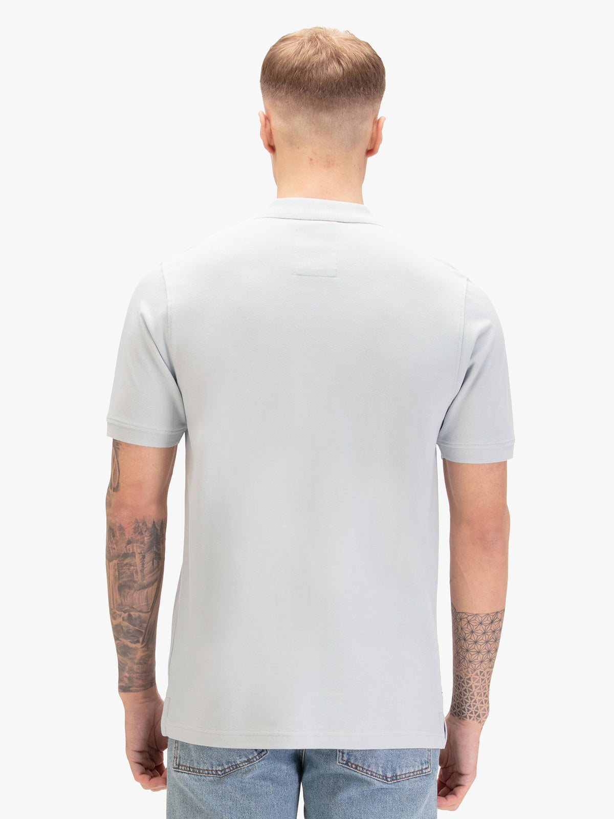 Men's blue-1 polo shirt with polo collar, worn by a model, back view