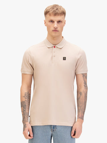 Men's beige polo shirt with polo collar, worn by a model, front view