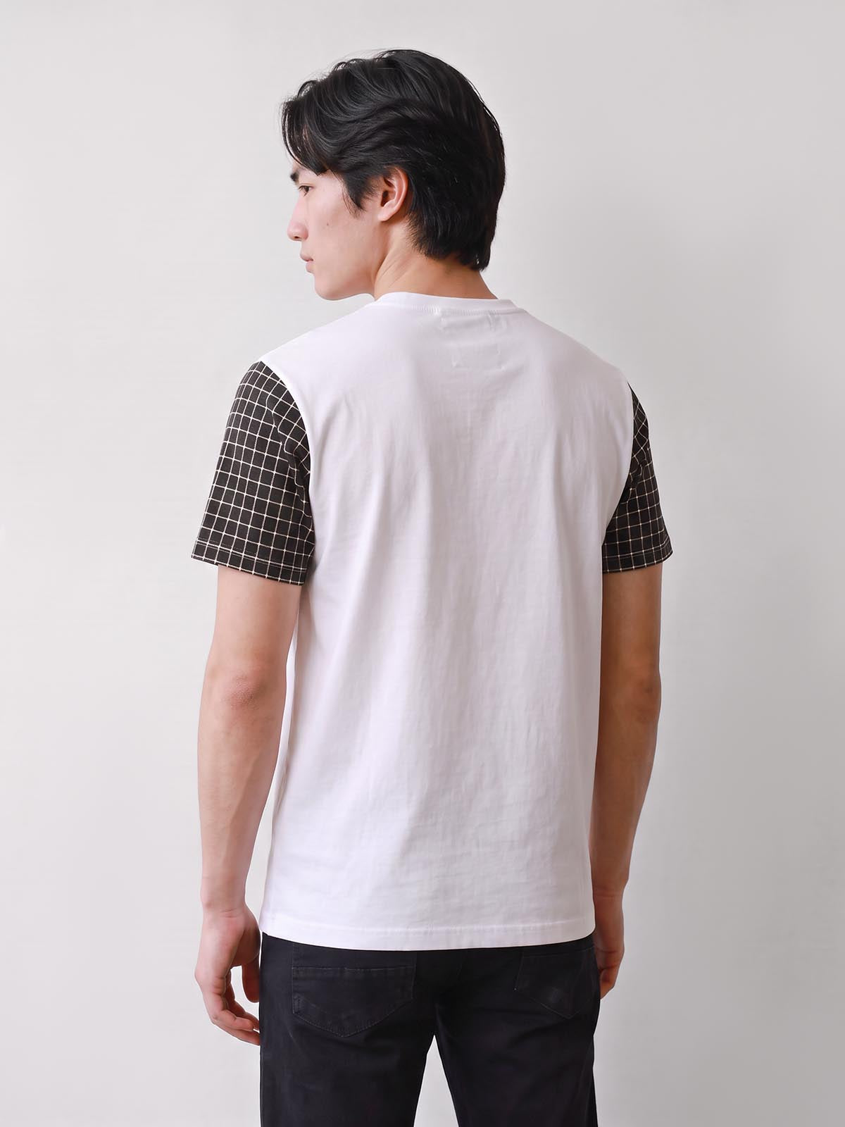 Back view of white LUKE 1977 Dale check sleeve t-shirt worn by model