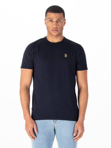 Men's navy t-shirt with crew neck and short sleeves worn by a model - front view.